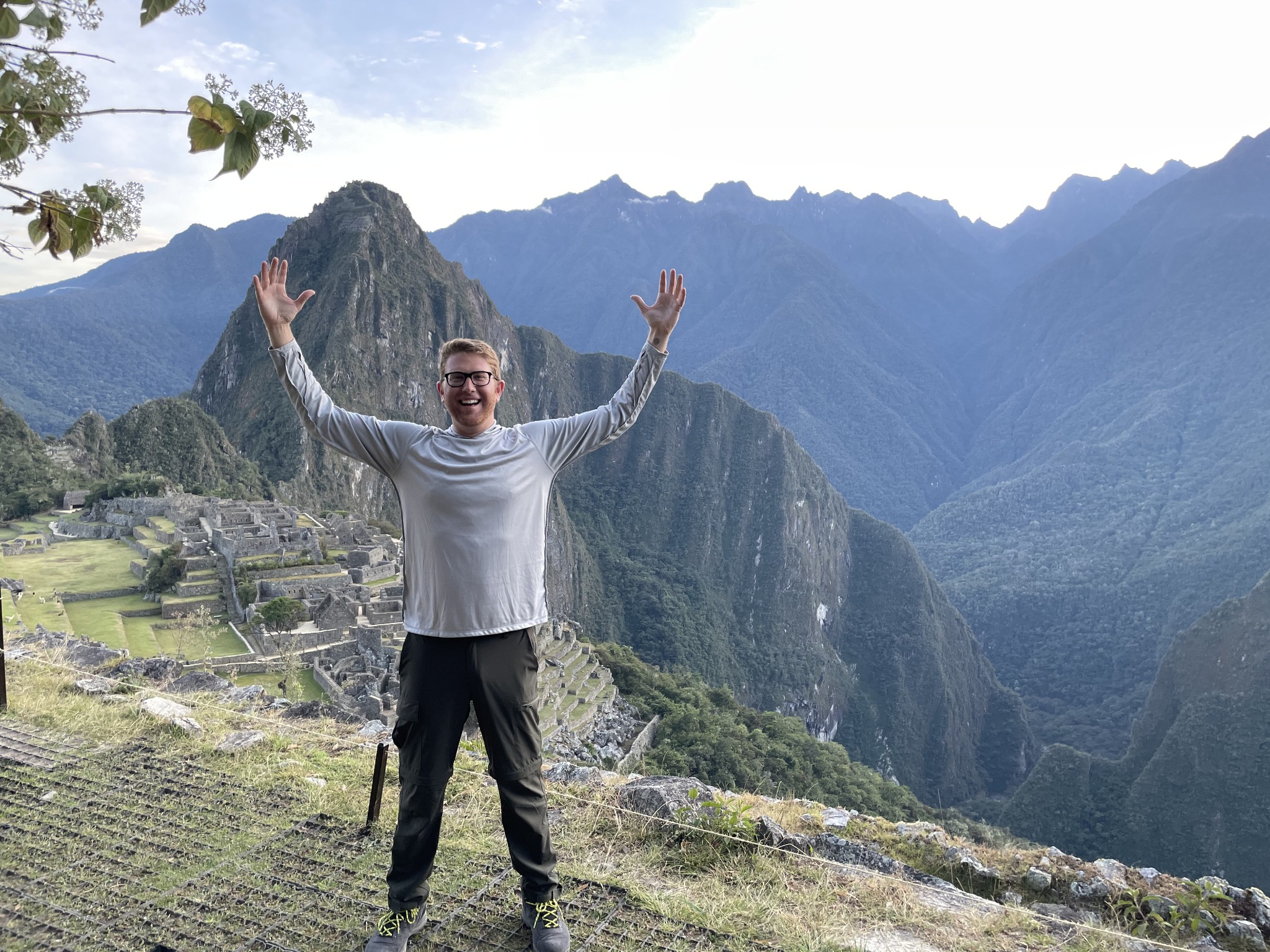 Carl at Machu Picchu, with mountains behind him